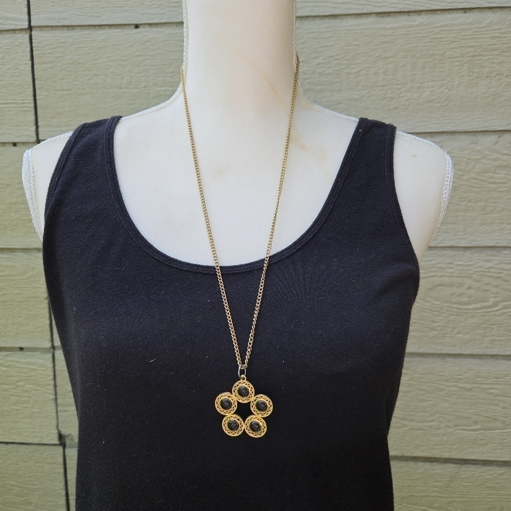gold tone chain necklace with gray marble and gold tone pendant